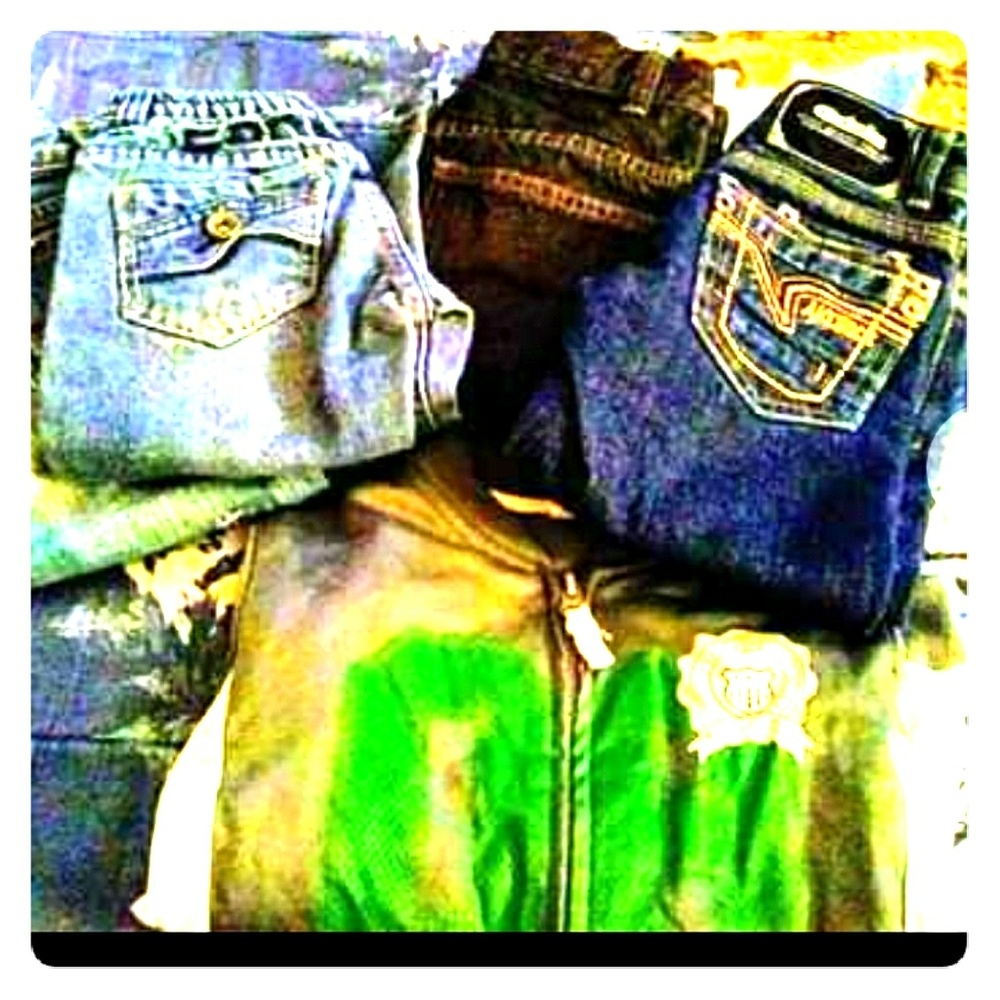 Three sets of toddler jeans , an a track jacket